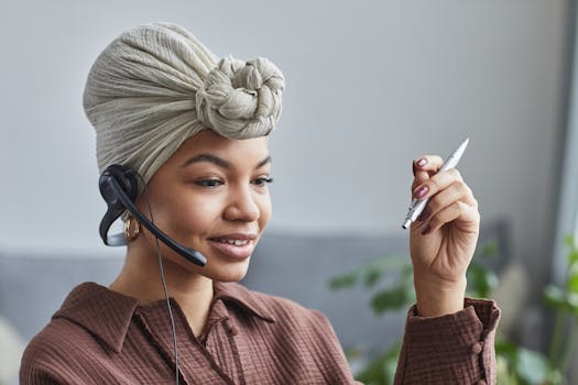 virtual assistant working on a laptop