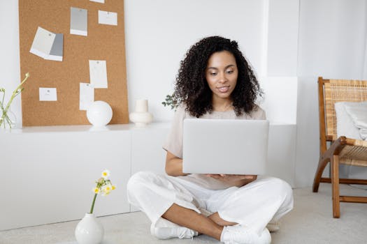 happy freelancer working on laptop