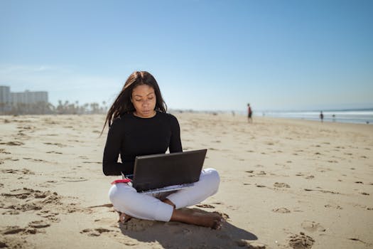 person working from a beach