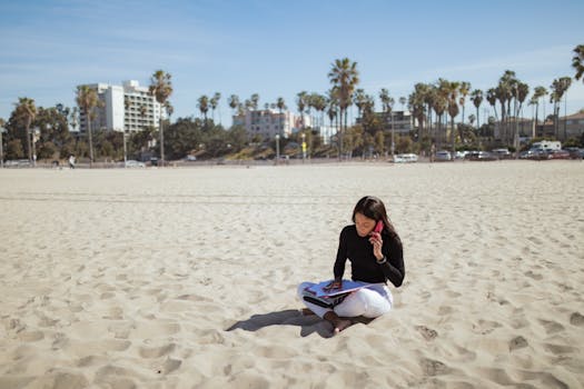 image of a digital nomad working from a beach