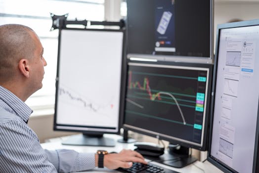 a person analyzing data on a computer