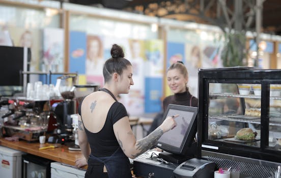 A person working on their side hustle at a coffee shop