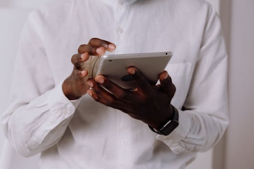 a person reading an article on a tablet