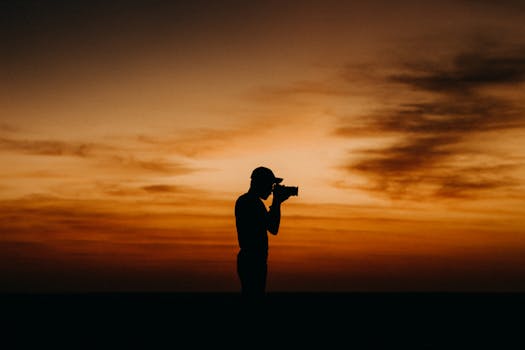 a photographer capturing a stunning landscape